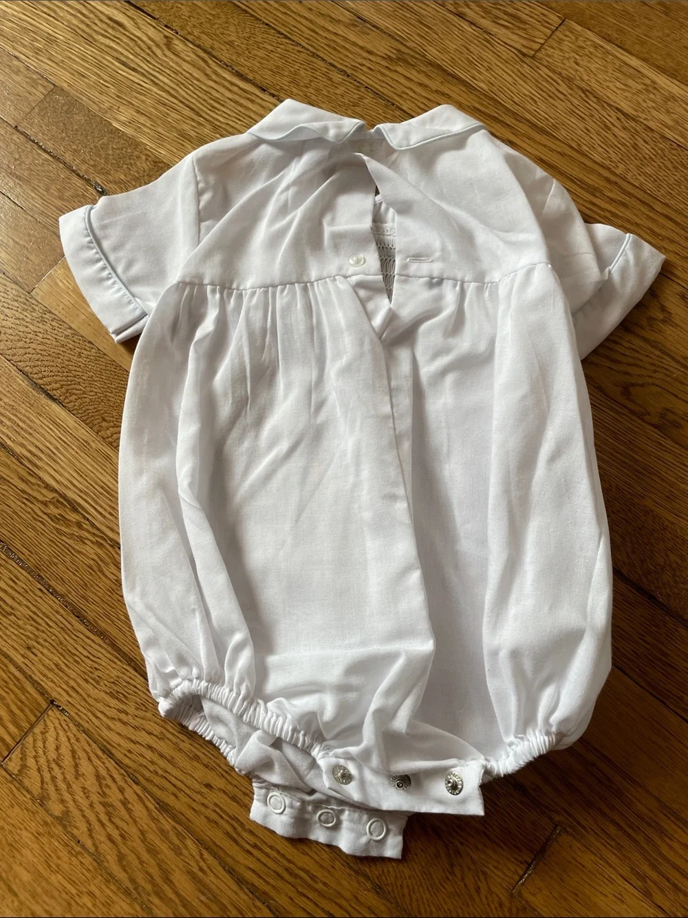 White Baby Bubble Romper with Blue Smocked Train Detail